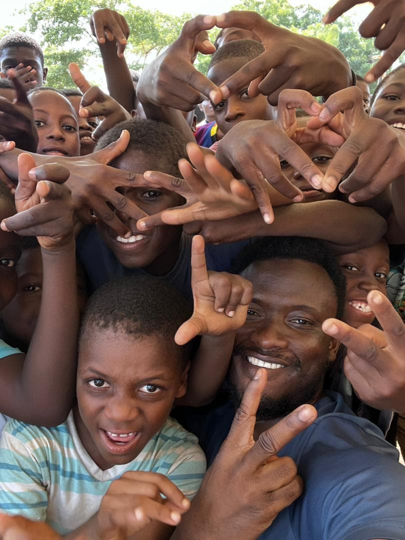 PlayChange Foundation volunteers running a community sports session in Ghana